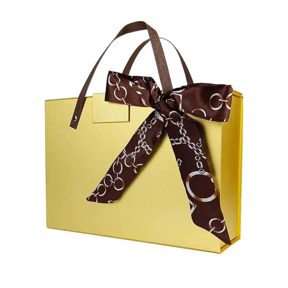 New Design Luxury Clothes Packaging Gift Magnetic Folding Boxes With Custom Ribbon